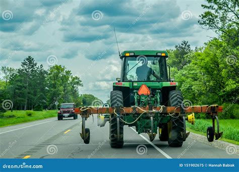 Farm Tractor Driving On Road Editorial Image Image Of Caution Farm