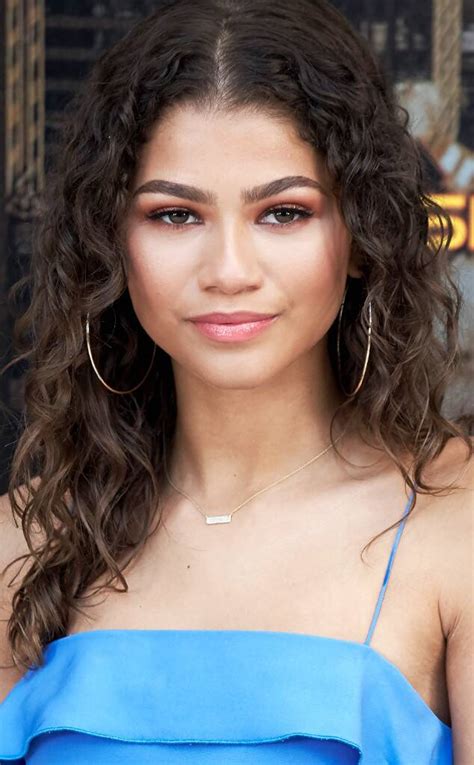 Layered short pixie hairstyle included very short layers of hairs on top and sides with a pixie cut. Zendaya from The Best Celebrity Curly Hairstyles | E! News