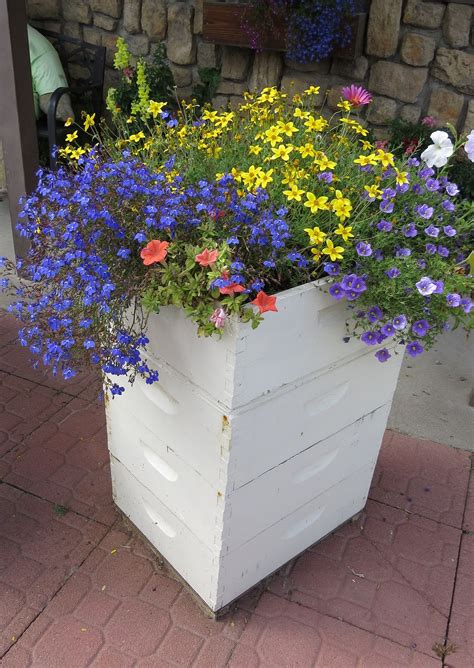 Maybe you would like to learn more about one of these? Bee Hive Planter | Bee hive, Bee boxes, Bee hives boxes