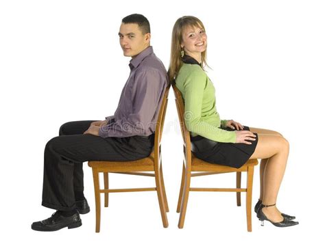 Woman And Man On The Chairs Man And Woman Sitting On The Chairs Back