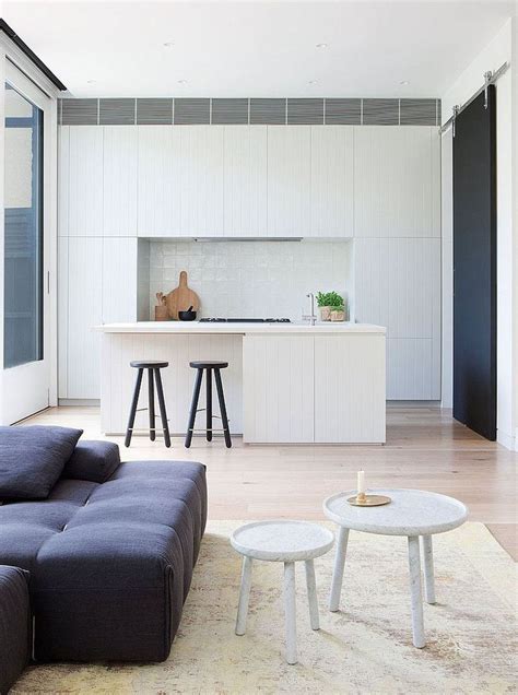 Wooden cabinets in the corner add textural contrast to minimalist. Kitchen Design Idea - White, Modern and Minimalist ...