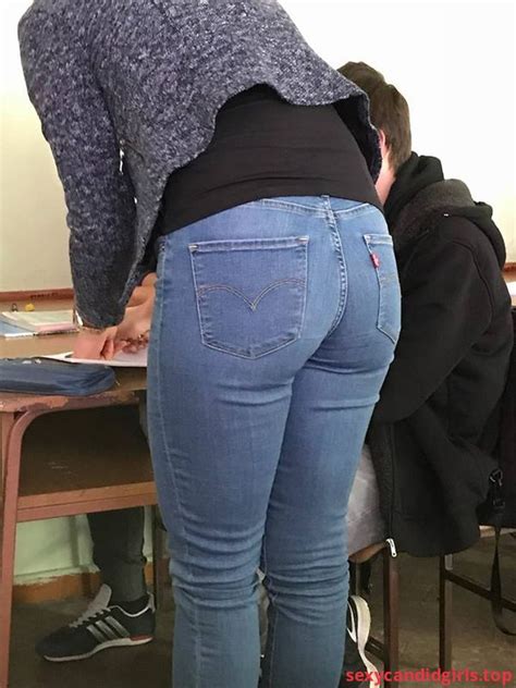 Sexycandidgirls Top Teacher In Tight Jeans Bending Over A Desk In