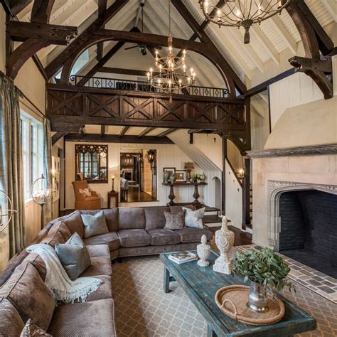 Tudor Style Family Room With Large Stone Fireplace And Loft Tudor Style Homes House Styles