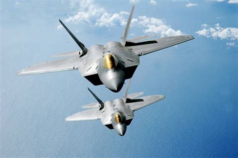 F 22 Raptors In Formation Photograph By Adam Romanowicz