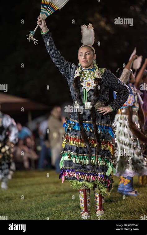 Native American Woman Performing Jingle Dress Dance During Sac And Fox Nation Pow Wow Stroud