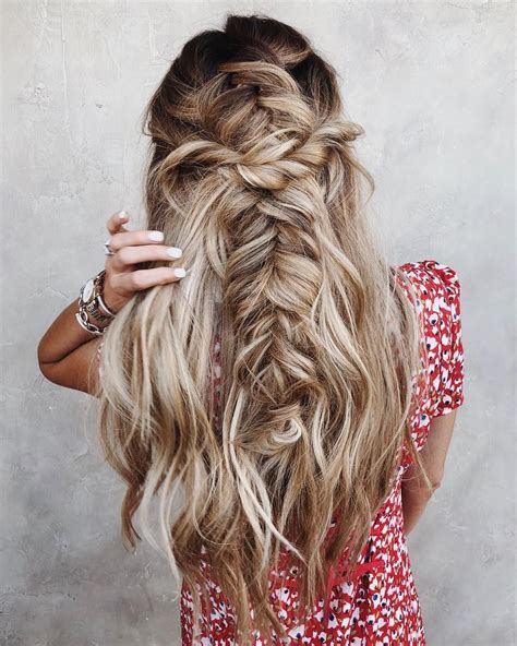 beautiful braided half up half down hairstyle