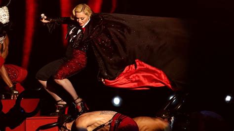 madonna clowns around and sheds tears for rocco at melbourne show bbc news