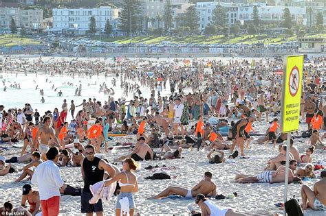 thousands ignore social distancing guidelines and head to bondi beach in sydney daily mail online