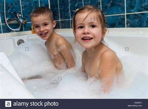 Brother And Sister Taking Bath