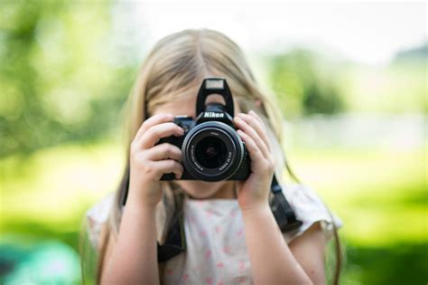 Child Using Camera Free Stock Photo - ISO Republic