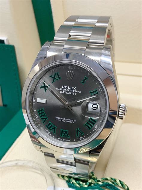 To view this watch please visit our shop located on north street, central guildford. Rolex Datejust 41 126300 Wimbledon Dial Unworn