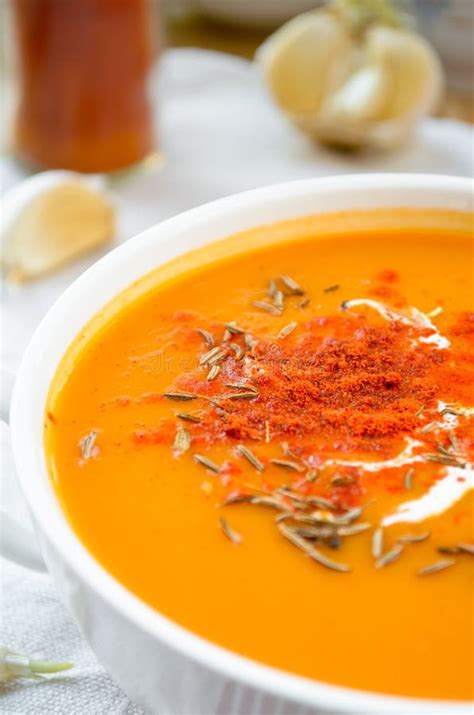 Vegetarian Carrot Pumpkin Cream Soup With Garlic And Cumin Stock Image