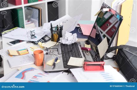 Messy And Cluttered Desk Stock Photo Image Of Workplace 97668344