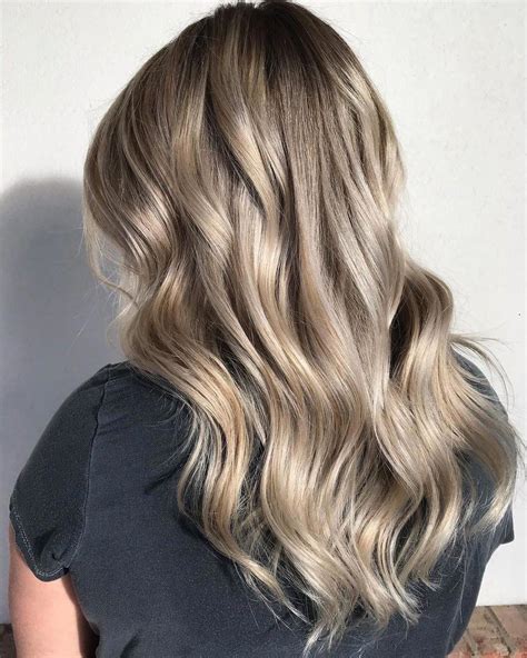 By breaking up the black hair with streaks of a lighter color, you can smoothly transition out of a solid black color in a gradual way. 35 Ash Blonde Hair Colors with Highlights, There are lots ...