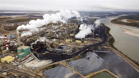 The Suncor Tar Sands Processing Plant Near The Athabasca River At Their