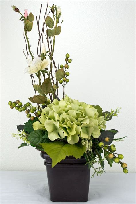 We understand that real flowers can easily devour your entire decoration budget. Hydrangea | Hydrangea arrangements, Modern flower ...