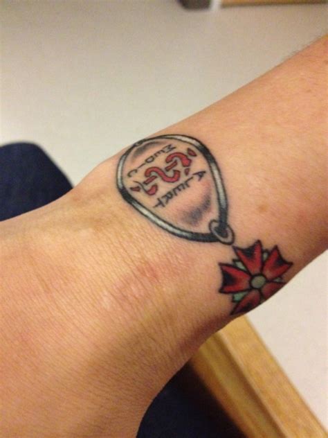 On the left is a medic alert tattoo on a diabetic (tattoo by stacy shappa at electric graffitti tattoo in muscatine, iowa). Like this one too, without the flowers. | Medical tattoo ...