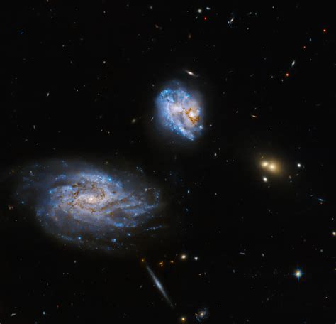 Hubble Observes Two Interacting Spiral Galaxies Science Environment