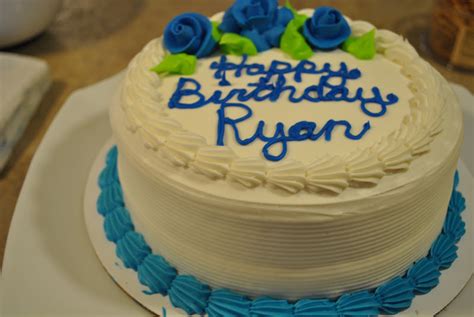 Birthday cake with three tiers and colorful sprinkles. Ryan Birthday Cakes