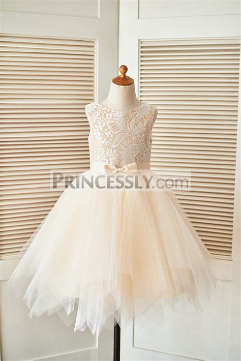 ivory lace champagne tulle flower girl dress with uneven hem and belt avivaly
