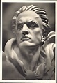 a black and white photo of a statue of a man with his hair blowing in ...