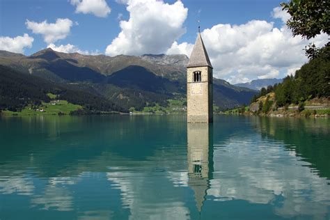 This Italian Lake Has A 14th Century Bell Tower Sticking Out Of It