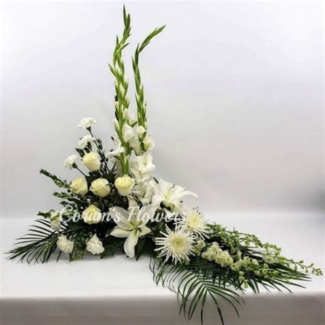 White And Ivory L Shaped Arrangement Corums Flowers And Ts Serving
