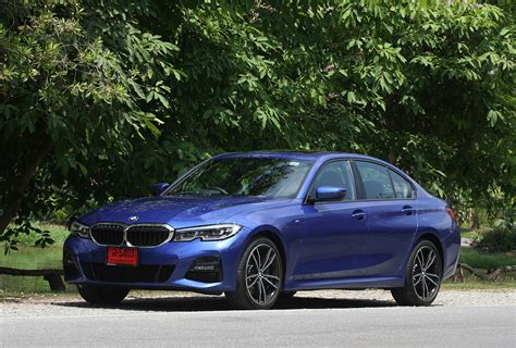 The iconic bmw logo, executed in the official colors of the bavaria region, depicts a stylized geometric image, which resembles an airplane propeller. BMW 330e M Sport plug-in hybrid (2020) review