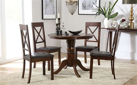 Crafted of solid asian rubberwood and manufactured wood in a rich finish, this side chair has a slatted backrest and four. Kingston Round Dark Wood Dining Table with 4 Kendal Chairs ...