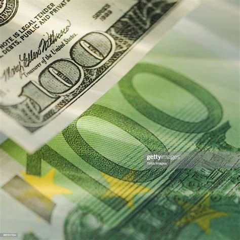 One Hundred Dollar Bill And One Hundred Euro Bill High Res Stock Photo