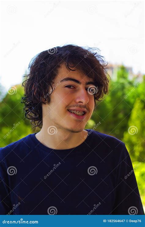 Portrait Of Young Handsome Man With Braces Stock Image Image Of Happy Home 182564647