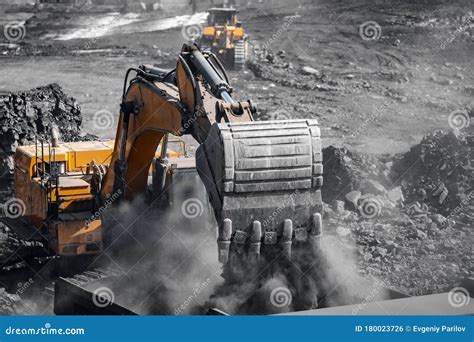 Excavator Work Loading Of Coal Into Yellow Mining Truck Open Pit Mine