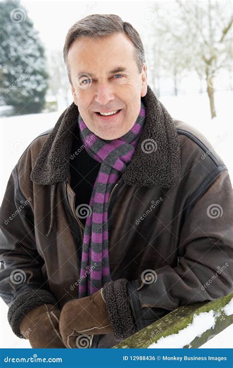 Senior Man Standing Outside In Snow Landscape Stock Photo Image Of