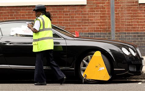 news drivers pay out £255m in parking fines as councils play rough