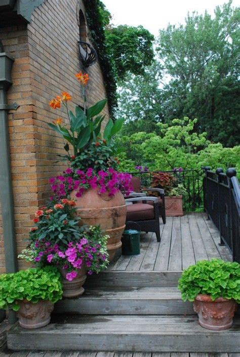 Tiny Porch With Big Beautiful Flowering Containers Patio Container