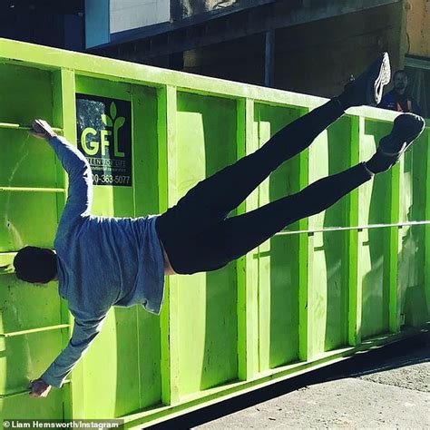 Liam Hemsworth Shows Off With An Impressive Human Flag Pose After Ex