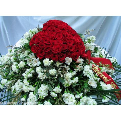 To learn more about cremation caskets and alternative containers, visit our page on cremation caskets. RED ROSE HEART & WHITE FLOWER CASKET SPRAY Rubrums Florist ...