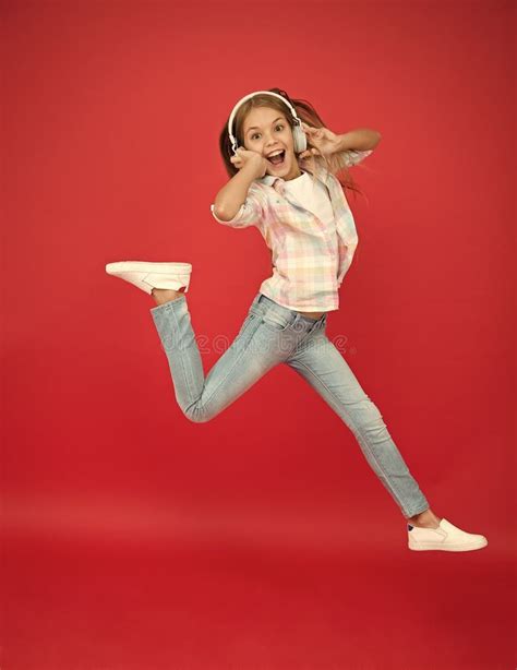 Jumping Mid Air Happy Small Girl Dancing Cute Child Enjoying Happy