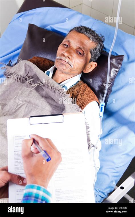 Indian Doctor Hospital Patient Writing Report Stock Photo Alamy