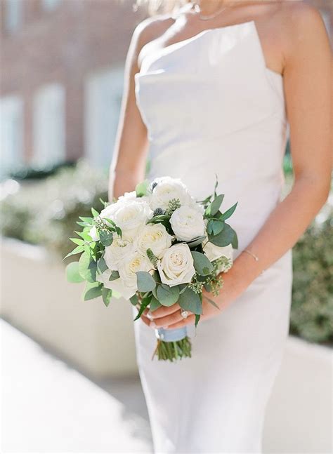 Bridal Bouquet With White Roses And Eucalyptus Leaves Wrapped With