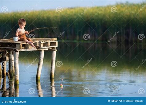 Little Boy Fishing On The Lake Stock Image Image Of Caucasian Hobby