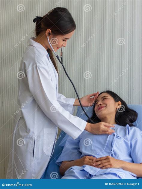 Female Doctor Checking Patient Using Stethoscope Stock Photo Image Of
