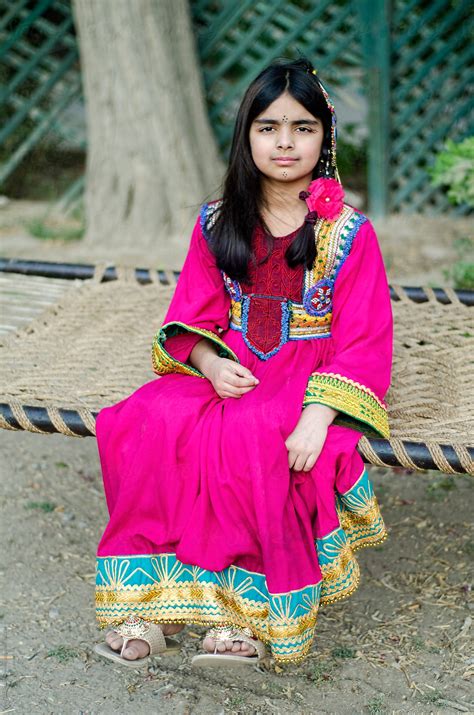 A Little Girl In A Sitting Pose By Stocksy Contributor Agha Waseem