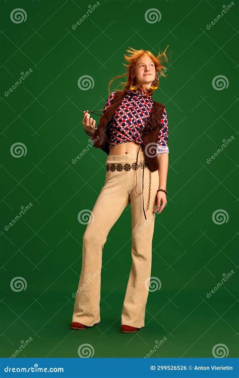 Full Length Portrait Of Happy Cheerful Young Girl Teenager Dressed
