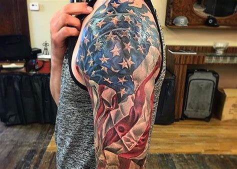 The flag and colors can fill in other symbols like skulls, boots, and even grave markers. Patriotic Shoulder Tattoos For Men - Tattoos Gallery