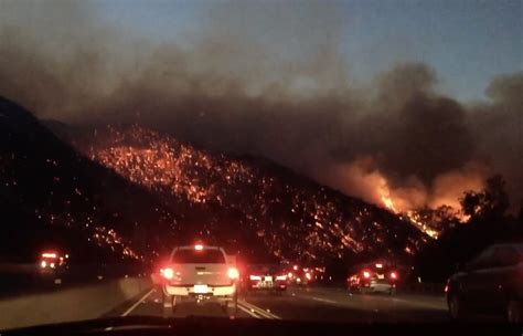 Las 405 Freeway Shut Down As Wildfire Near Getty Destroys Homes