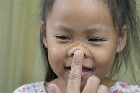 Asian Mother And Child Girl Playing Pinch Cheeks Touch Nose Funny Face