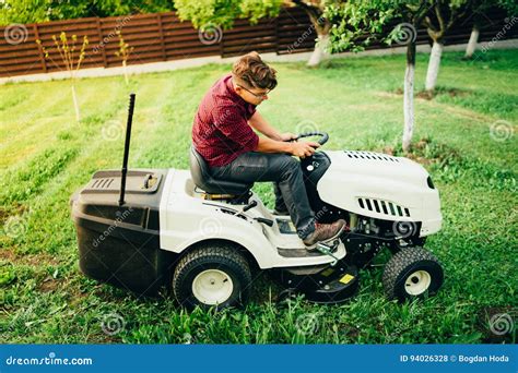 Worker Handyman Trimming Grass Using Lawn Mower Stock Photo Image Of