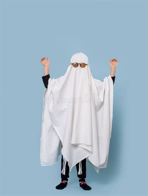 Baby Ghost In Glasses Shot Isolated On A Blue Stock Image Image Of