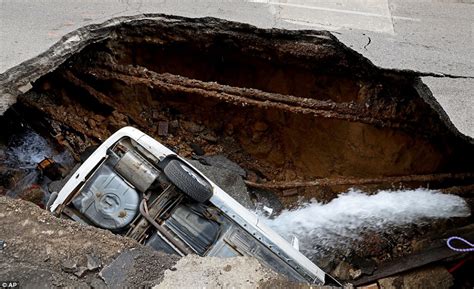 Sinkhole Swallows Up Car In Downtown St Louis Daily Mail Online